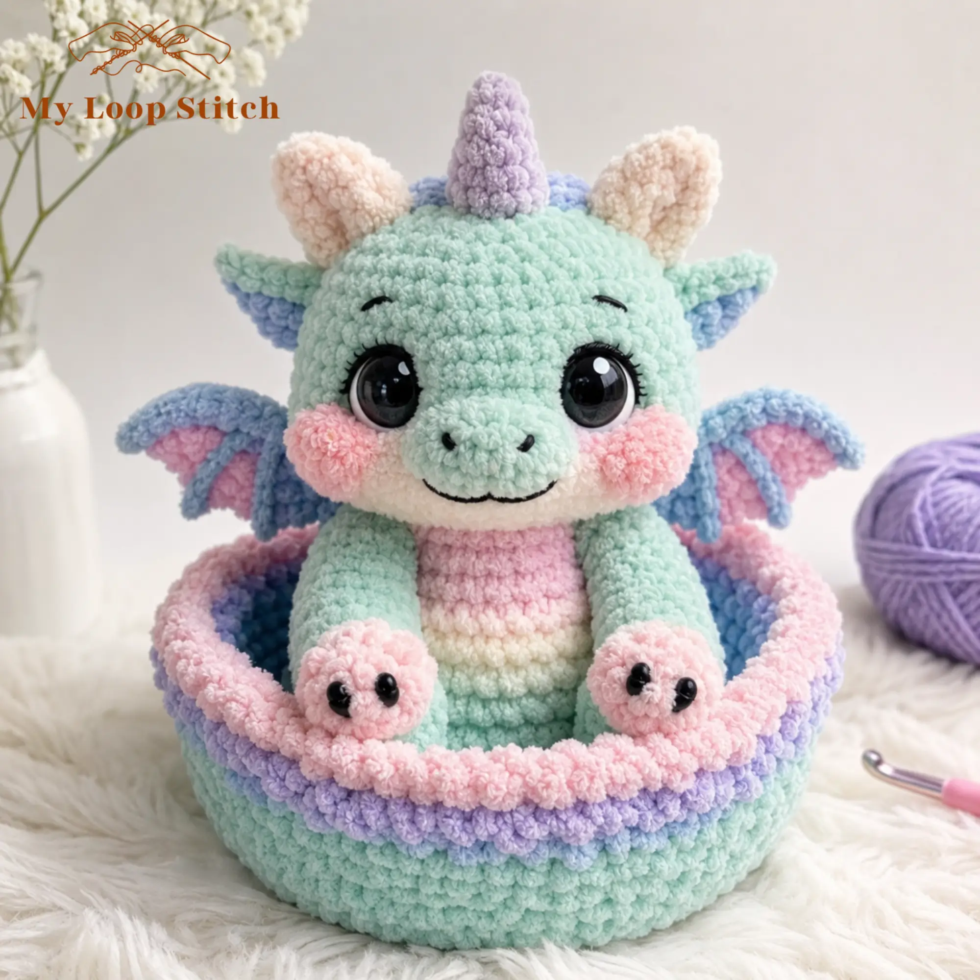 Dragon Amigurumi Pattern PDF – Pastel Baby Dragon in a Basket Cute baby dragon crochet pattern showing a plush mint-green dragon with pink cheeks and a lavender horn